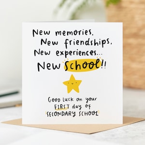 May include: A white card with black text that reads "New memories. New friendships. New experiences... New School!! Good luck on your FIRST day of SECONDARY SCHOOL". A yellow star with a smiley face is above the text.