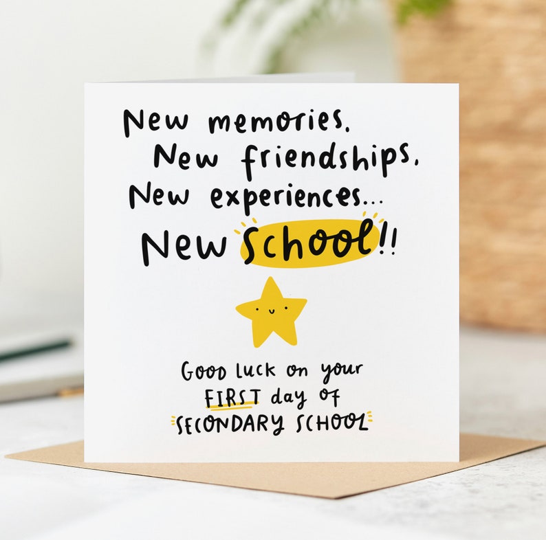 May include: A white card with black text that reads "New memories. New friendships. New experiences... New School!! Good luck on your FIRST day of SECONDARY SCHOOL". A yellow star with a smiley face is above the text.