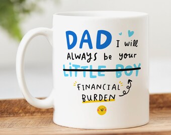 Puede incluir: Taza de cerámica blanca con un diseño azul y negro. La taza dice "Papá, siempre seré tu pequeño niño, carga financiera".
