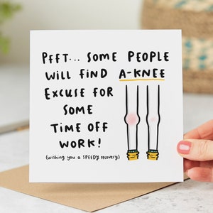 May include: A white card with a humorous get well soon message. The card features a cartoon illustration of two legs with a red knee injury. The text reads "PFFT... SOME PEOPLE WILL FIND A-KNEE EXCUSE FOR SOME TIME OFF WORK! (wishing you a SPEEDY recovery)"