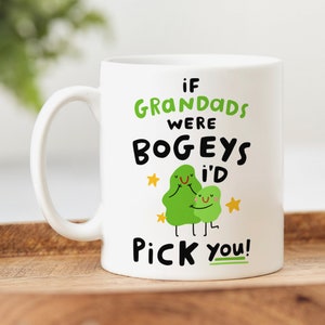May include: White ceramic mug with a green, black, and yellow design. The mug reads "If Grandads were BogEys I'd Pick You!"