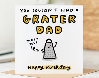 Op de afbeelding: Een witte kaart met een gele en zwarte illustratie van een rasp met een gezicht. De kaart zegt "You couldn't find a Grater Dad. That's you! Happy Birthday."