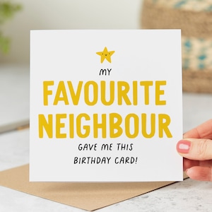 May include: A white card with a yellow star and the text "My Favourite Neighbour Gave Me This Birthday Card!"