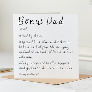 May include: A white card with black text that reads "Bonus Dad (noun)". The text continues, "A Dad by choice. A special kind of man who chooses to be a part of your life, bringing unlimited amounts of love and care with him. Always prepared to offer support and guidance whenever it is needed. happy birthday".