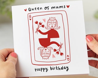 May include: A white card with red and pink illustrations of a queen of hearts playing card with the text "Queen of Mums" and "Happy Birthday".