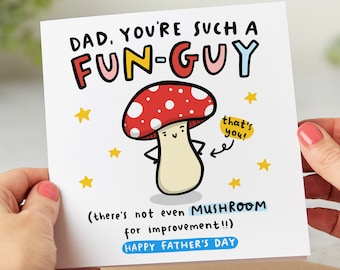 Puede incluir: Una tarjeta blanca con una ilustración de un hongo rojo y blanco y el texto "DAD. YOU'RE SUCH A FUN-GUY (there's not even MUSHROOM for improvement!!) HAPPY FATHER'S DAY".