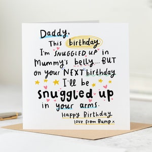May include: A white card with a handwritten message to a father-to-be. The message reads "Daddy, This birthday I'm snuggled up in Mummy's belly... BUT on your NEXT birthday I'll be snuggled up in your arms. Happy Birthday love from Bump x".