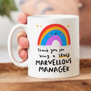 May include: White ceramic mug with a rainbow design and the text "Thank you for being a TRULY MARVELLOUS MANAGER".