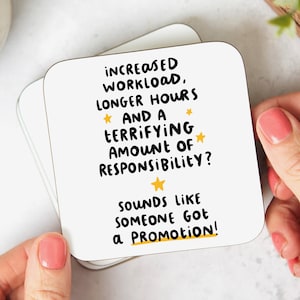 May include: White coaster with black text that reads "Increased workload, longer hours * and a terrifying amount of responsibility? Sounds like someone got a promotion!" with yellow stars.