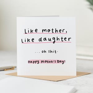 Square white Mother's Day card with black text and pink highlights reading Like mother, Like daughter... oh shit Happy Mother's Day