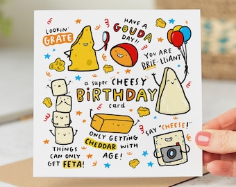 May include: A white card with a cheesy birthday theme. The card features illustrations of different types of cheese with faces and the text "Have a Gouda Day!"  "You are Brie-lliant" "a super Cheesy Birthday card" "Only getting Cheddar with age!" "Say "Cheese!" "Things can only get Feta!"