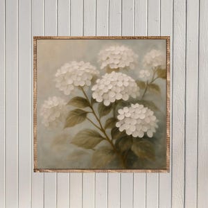 May include: A framed painting of white hydrangea flowers with green leaves and brown stems. The artwork has a soft, painterly style and is set against a light blue background. The frame is made of wood.