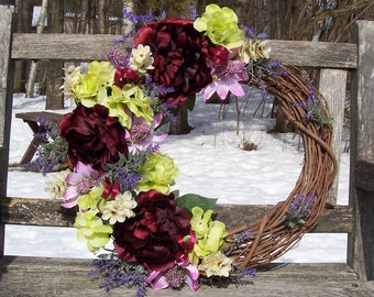 Grapevine Wreath.  Makes me think "romantic vintage."