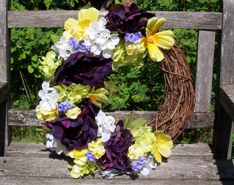 Grapevine Wreath.  Beautiful Mix of Colors.  About 15 inches finished.  Peony, Hydrangea, Cosmos, etc.