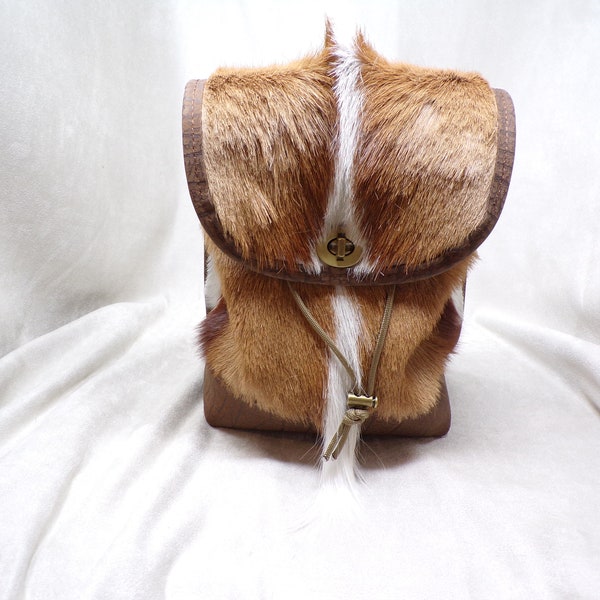 real SPRINGBOK FUR and cape buffalo leather backpack, medium size, brown/ivory, looks brand new, lined, inner cell phone pouch (#1948)