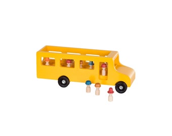 May include: A bright yellow wooden toy school bus with black wheels and several small wooden figures with colorful hats. The bus has open windows and is designed for children's play. The figures are approximately 2 inches tall.