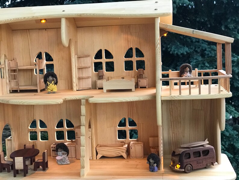 wooden dollhouse with garage