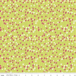 May include: A green fabric with a repeating pattern of white and pink flowers. The flowers are simple and stylized, with a single stem and a rounded bloom.