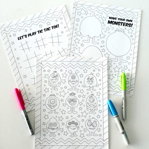 May include: Three printable coloring pages featuring monsters. The first page has a tic-tac-toe grid with the text "Let's Play Tic Tac Toe!" The second page has six different monsters with stars and a chevron pattern. The third page has two blank monsters with stars and a chevron pattern and the text "Make Your Own Monsters!"