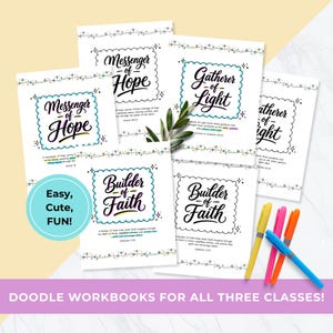 May include: A collection of doodle workbooks with titles like "Messenger of Hope," "Gatherer of Light," and "Builder of Faith." The workbooks are white with decorative borders and colorful text. The image also includes colorful pens.