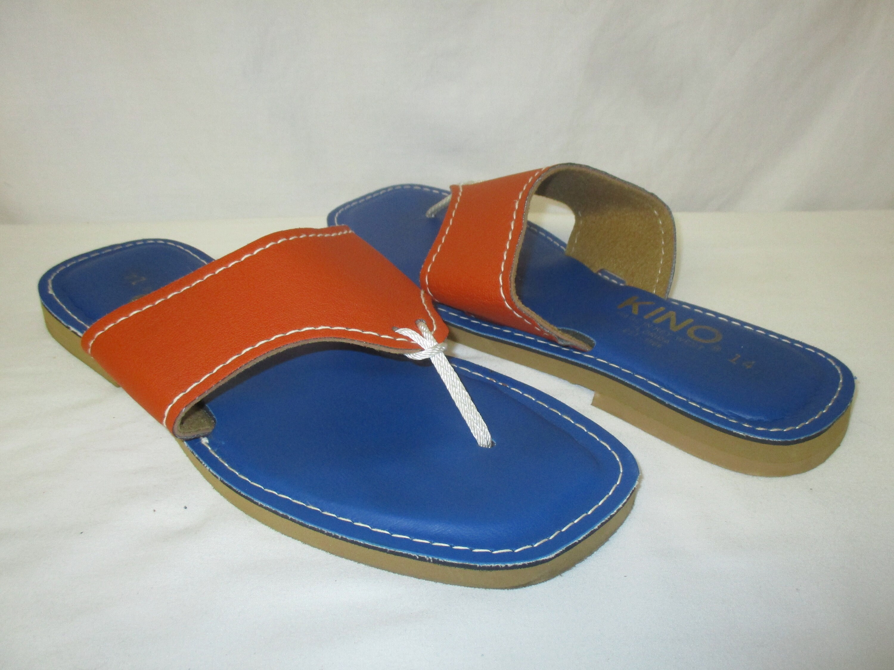 blue leather flip flops