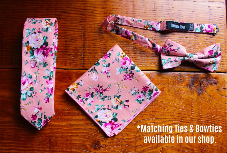 May include: A pink floral patterned tie, bow tie, and pocket square. The bow tie has a label that reads "Groomsman Bear". The text "Matching Ties & Bowties available in our shop." is at the bottom of the image.