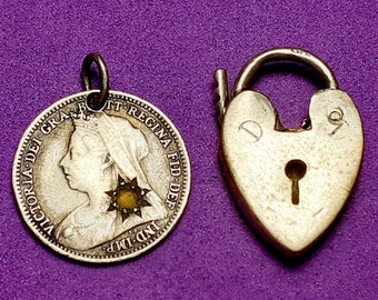 Victorian silver charm pair- 1897 threepence charm set with small yellow stone + silver heart padlock