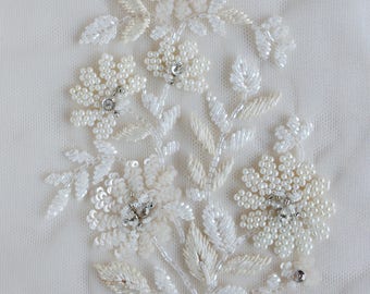 Diamond shaped hand-made motif with flowers of tiny pearls and sequins