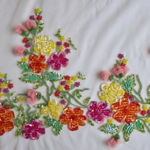 Tulle hand-embroidered using velvet and satin applique work in glorious summer colors