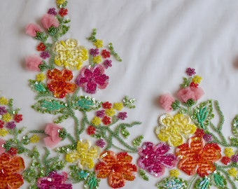 Tulle hand-embroidered using velvet and satin applique work in glorious summer colors