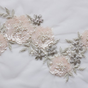 Hand-made motif with pale pink sequin flowers and silver wire embroidery