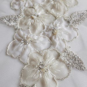 Hand-made motif with applique silk organza flowers