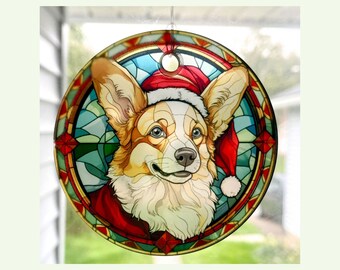 May include: A stained glass ornament featuring a corgi wearing a red Santa hat. The ornament is round and has a gold border. The corgi is depicted in a colorful stained glass style.