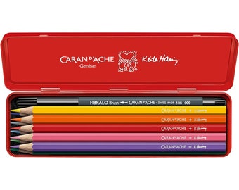 Caran d'Ache verfkleurenset | Keith Haring speciale editie | 10 x wateroplosbare kleurpotloden + 1 zwarte viltstift | Verzamelaarsblik