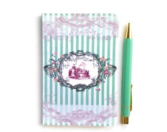 Striped notebook and Hamlet of Marie Antoinette in Versailles. Paris. Made in France.