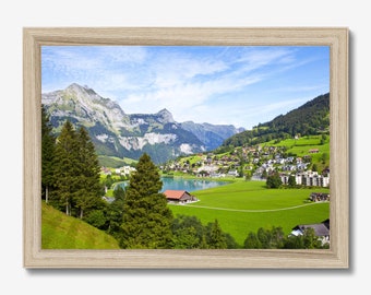 Beautiful Classic Framed Print Featuring Engelberg Village Alps Design.  Choose Black, White or Natural Frame.