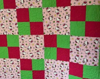 Celebrate Hello Kitty's 50th birthday with this Quilt!  Handmade, Professional Quilting, Made in USA, Reversible