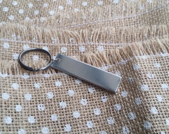 50 polerowanych, półfabrykatów do breloków 1/2" x 2" 14g 1100 aluminium bezpieczne dla żywności - płaskie