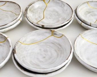 Kintsugi-ringschaal: handgemaakt Wabi Sabi-keramiek, traditioneel goudreparatie