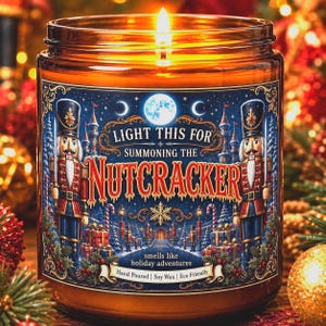 May include: A lit candle in a clear glass jar with a label featuring two nutcracker figures, a full moon, and text that reads LIGHT THIS FOR SUMMONING THE NUTCRACKER and smells like holiday adventures. The label includes illustrations of gifts.