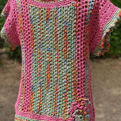 Pullover long freeform crochet top shops with unique surface embellishments.
