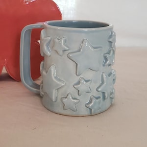 Keramische mok met sterren