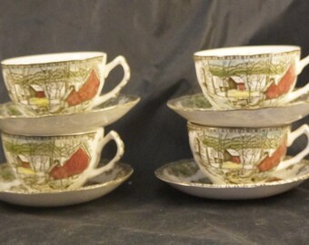 Four Cups and Saucer from Johnson Brothers in the Friendly Village Pattern
