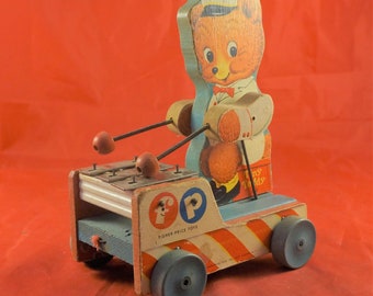 fisher price tiny teddy pull toy