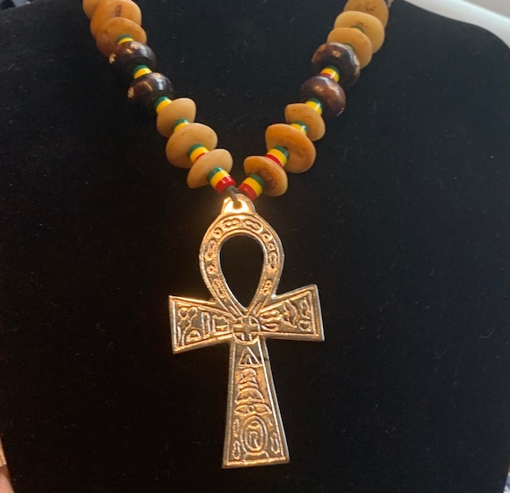 Unc cross necklace deals