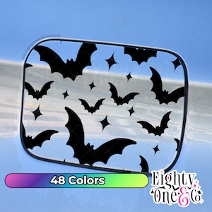 May include: A black and white gas tank decal with a repeating pattern of bats and stars. The decal is available in 48 colors. The text "Eighty One & Co." is in the bottom right corner of the image.
