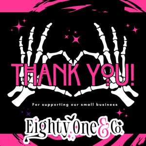 a pink and black thank you sign with skeleton hands