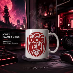 A mug with the text "666 News" printed on it, placed on a desk with a computer monitor, keyboard, and mouse in the background.