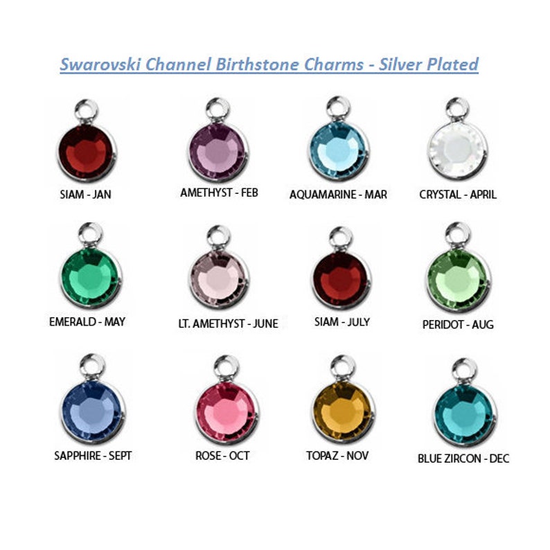 May include: Twelve silver-plated charms with different colored Swarovski crystals, each representing a birthstone for a different month of the year. The charms are arranged in three rows of four, with the month and birthstone name listed below each charm.