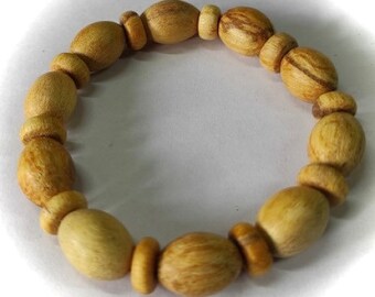 Palo Santo bracelet oval beads(10x15mm) and donut beads(4x9mm).